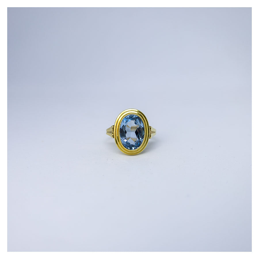 Vintage 14 karaat gouden ring met ovale aquamarijn en dubbele gouden rand