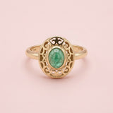 Vintage ring met smaragd en platte sierrand - 9 karaat goud
